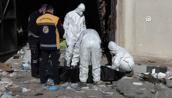 Suriye'de tüyler ürperten görüntüler: Toplu mezara dönüşen eczane! 20'den fazla kişi…